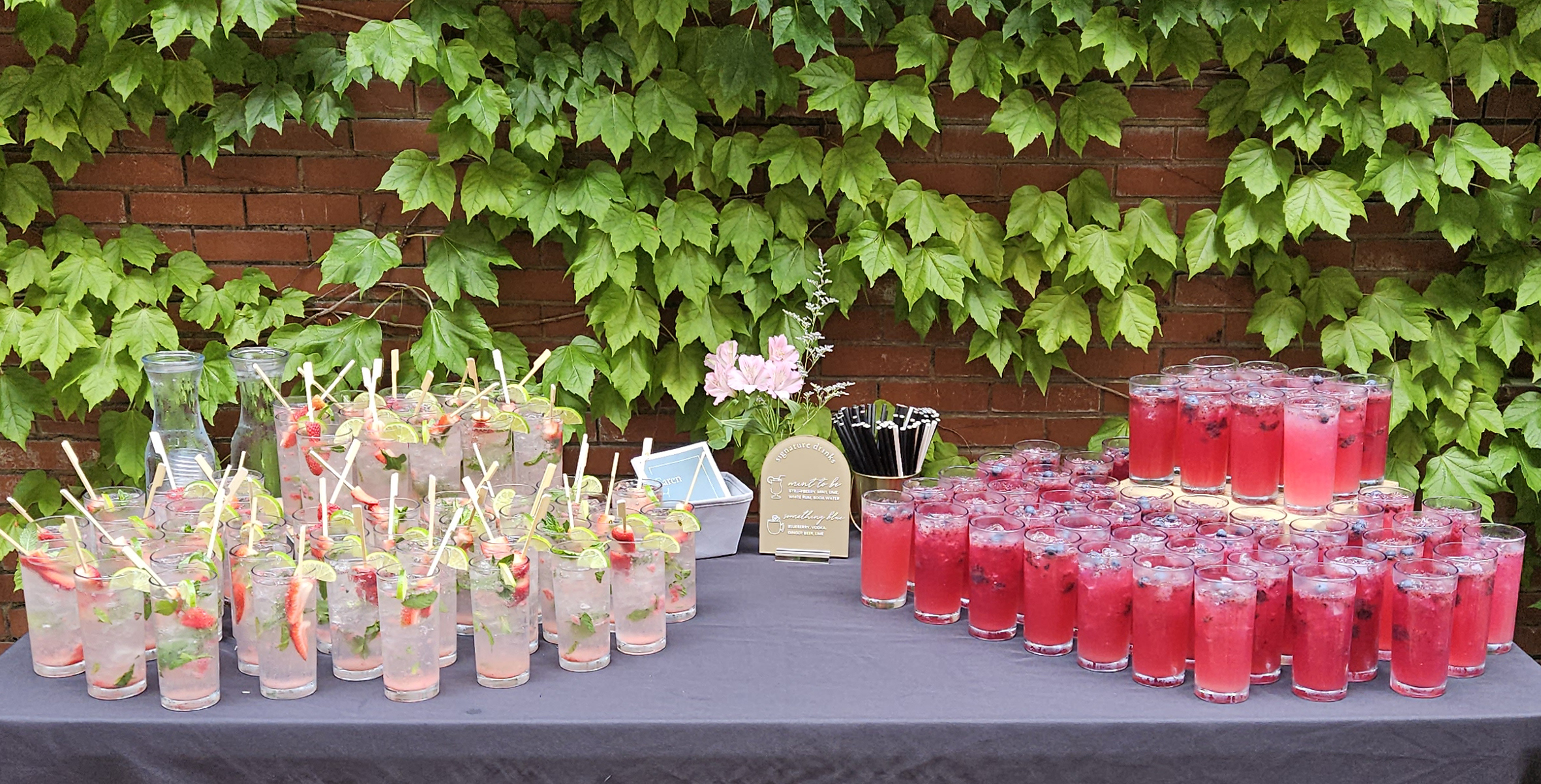 Mixed drinks by Special Event Spirits being presented on a table at an event